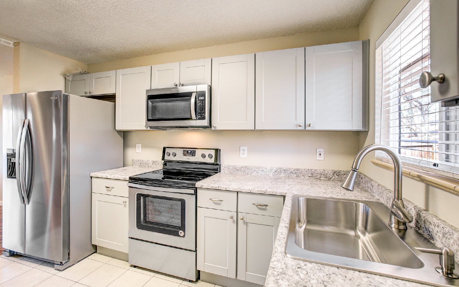 Updated 3-Bedroom Ranch with Finished Basement, Garage, and Fenced Yard Near Fort Carson and Peterson SFB property image