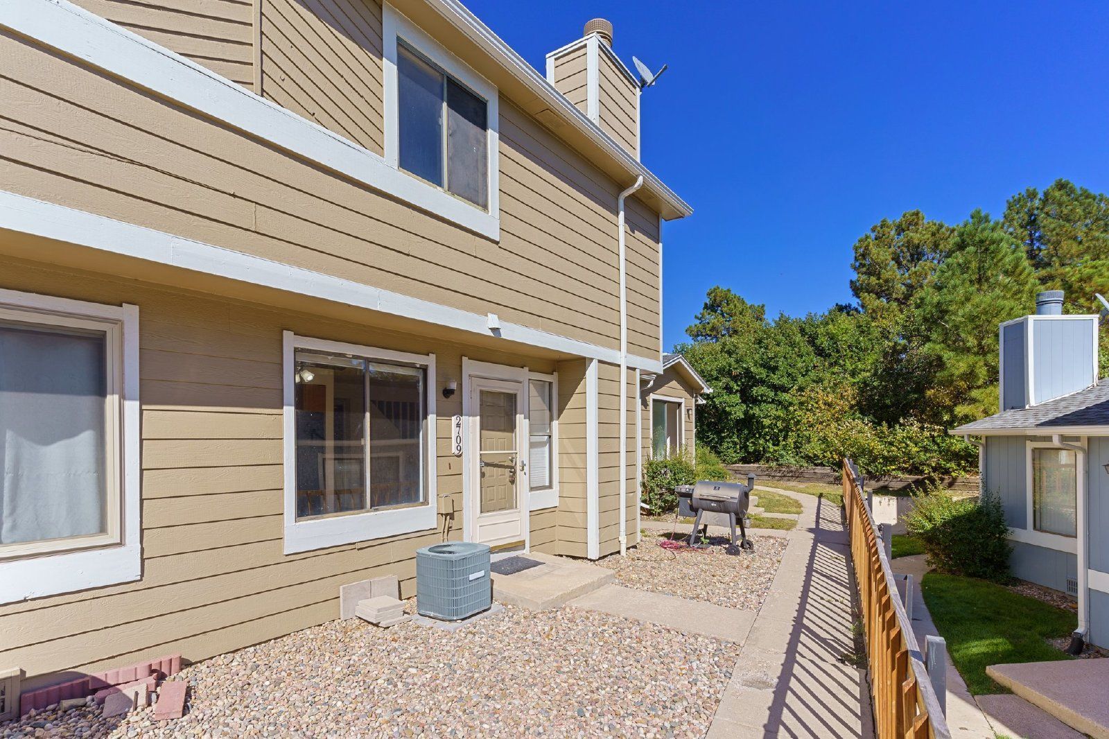 Freshly Painted 2-Bedroom Townhome with Fireplace, Hardwood Floors, and Central A/C Near Peterson SFB property image