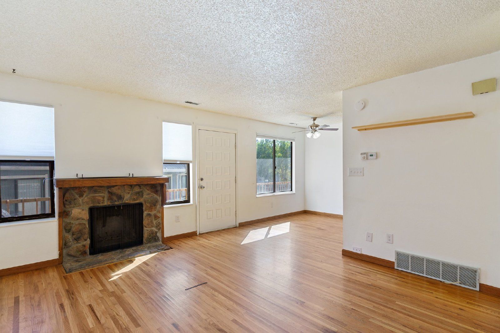 Freshly Painted 2-Bedroom Townhome with Fireplace, Hardwood Floors, and Central A/C Near Peterson SFB property image