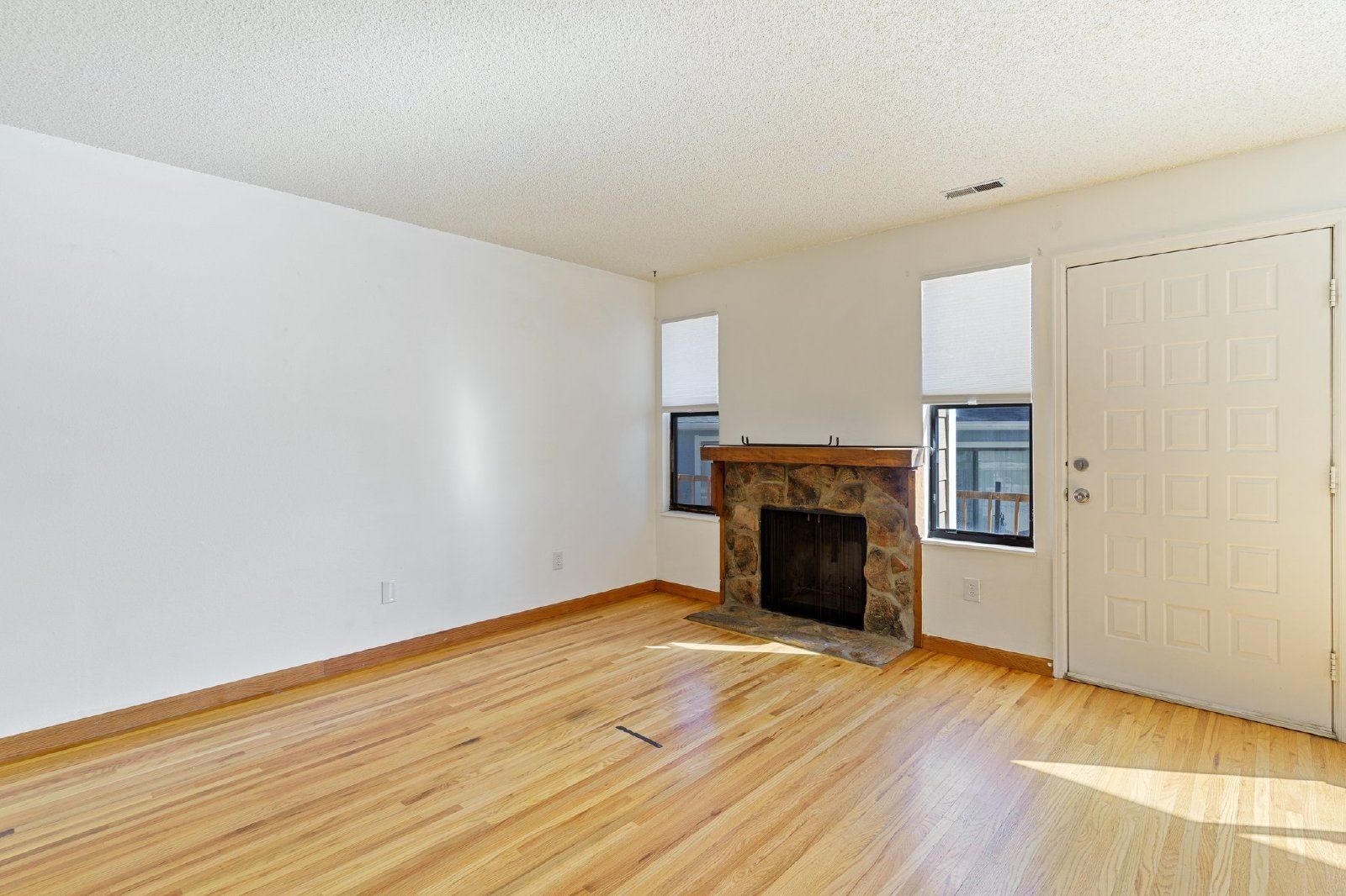 Freshly Painted 2-Bedroom Townhome with Fireplace, Hardwood Floors, and Central A/C Near Peterson SFB property image