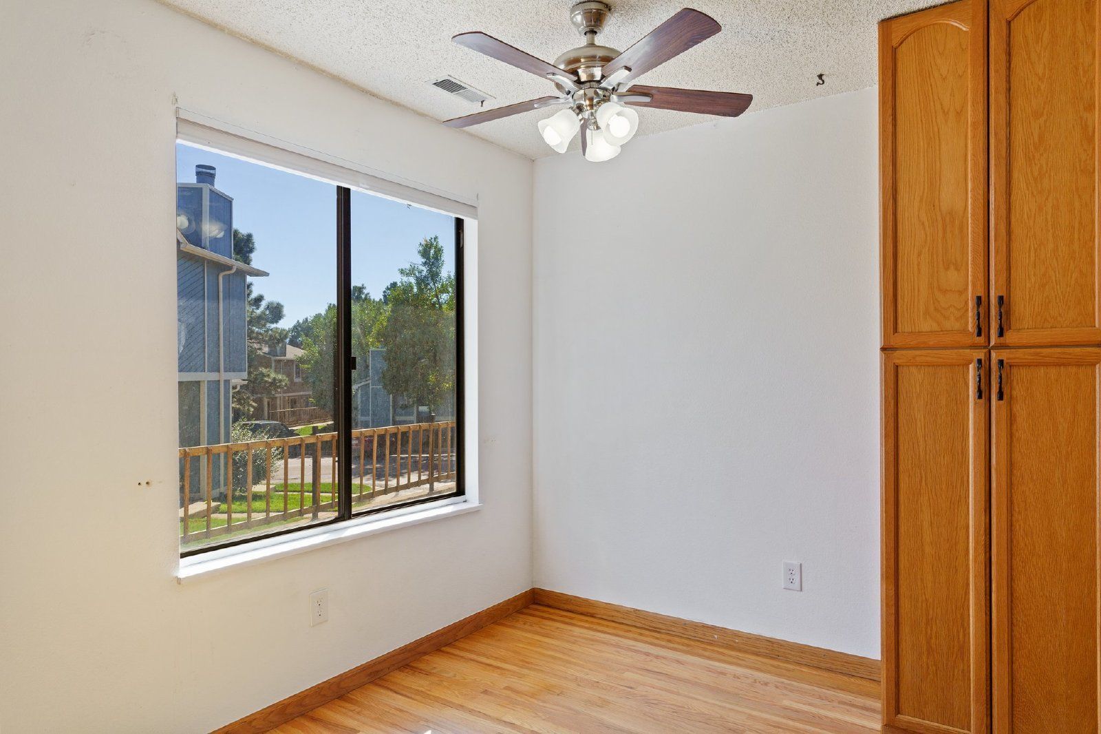 Freshly Painted 2-Bedroom Townhome with Fireplace, Hardwood Floors, and Central A/C Near Peterson SFB property image