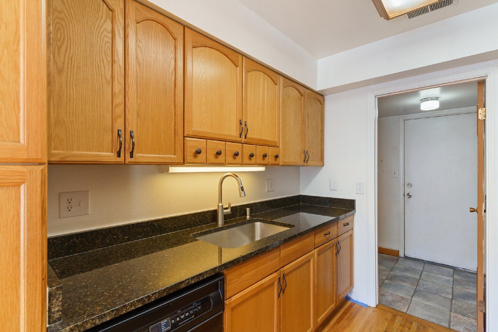 Freshly Painted 2-Bedroom Townhome with Fireplace, Hardwood Floors, and Central A/C Near Peterson SFB property image