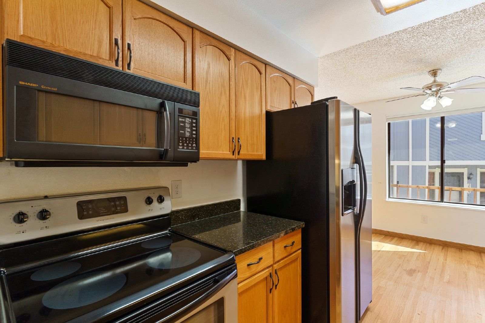 Freshly Painted 2-Bedroom Townhome with Fireplace, Hardwood Floors, and Central A/C Near Peterson SFB property image