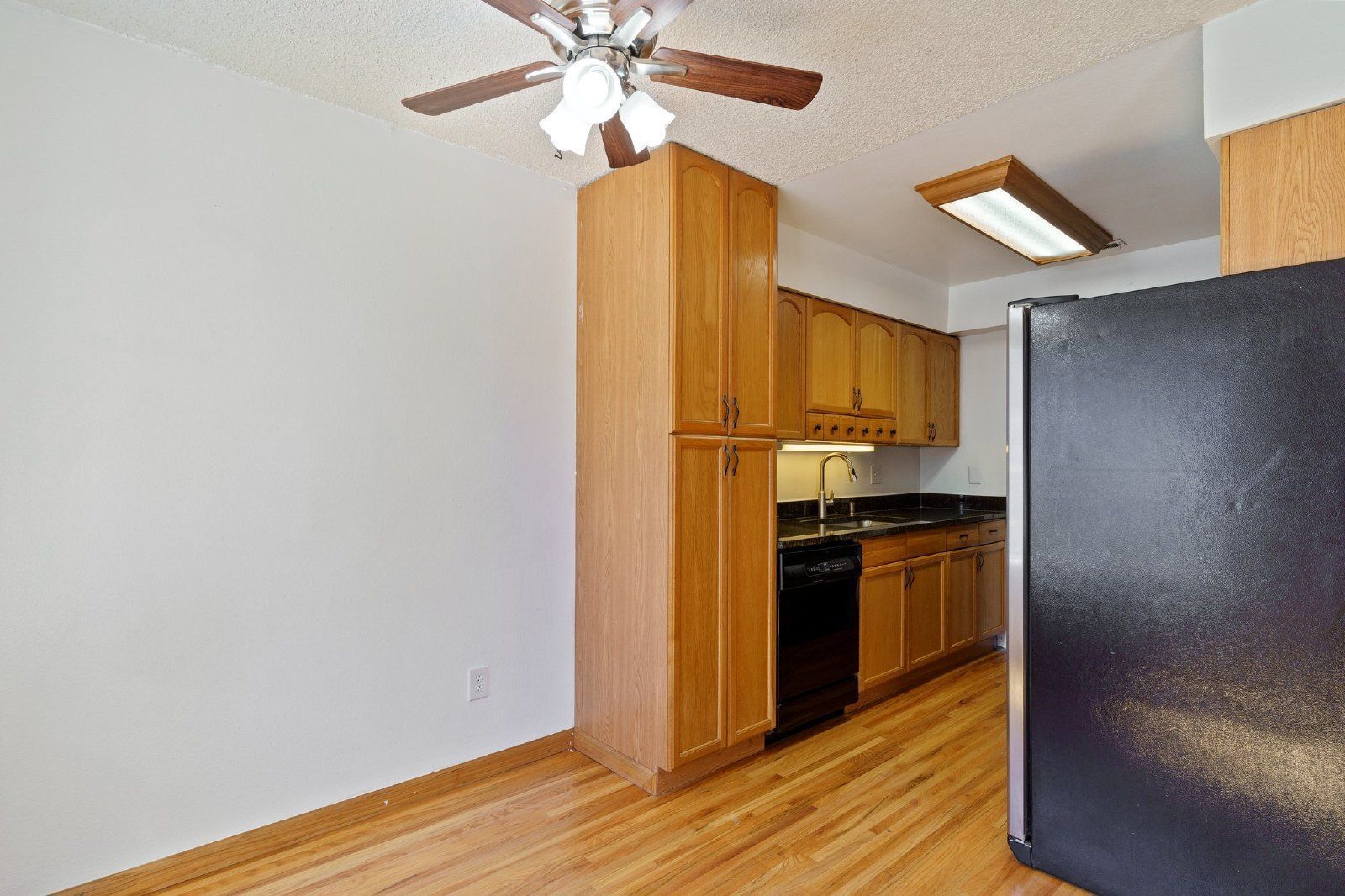 Freshly Painted 2-Bedroom Townhome with Fireplace, Hardwood Floors, and Central A/C Near Peterson SFB property image