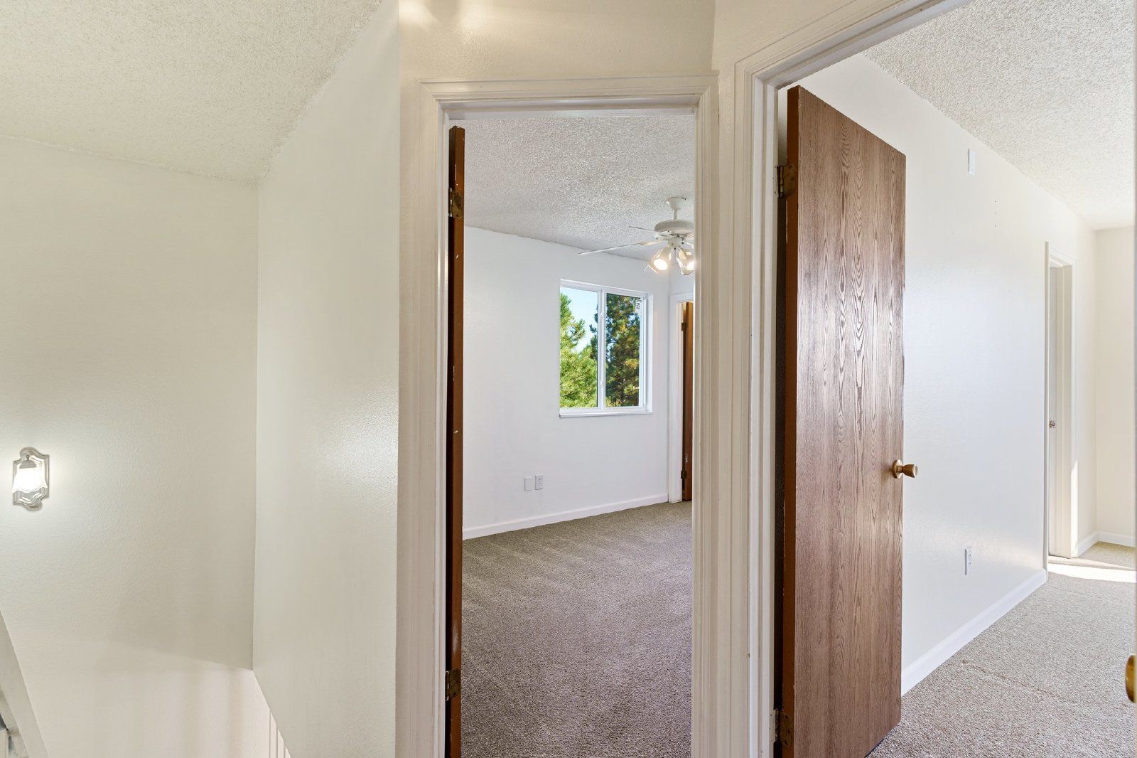 Freshly Painted 2-Bedroom Townhome with Fireplace, Hardwood Floors, and Central A/C Near Peterson SFB property image