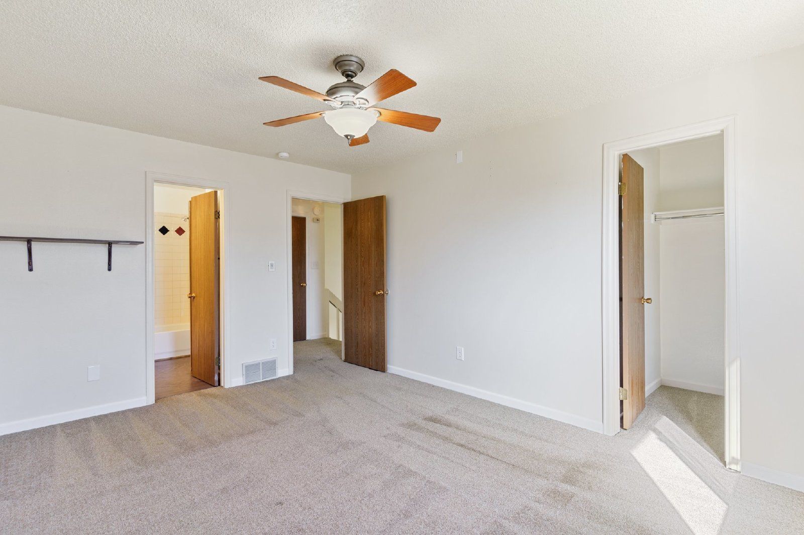Freshly Painted 2-Bedroom Townhome with Fireplace, Hardwood Floors, and Central A/C Near Peterson SFB property image