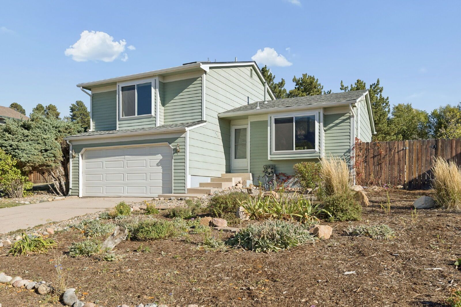Updated 4-Bedroom Home with A/C, Finished Basement, and 2-Car Garage Near Fort Carson property image