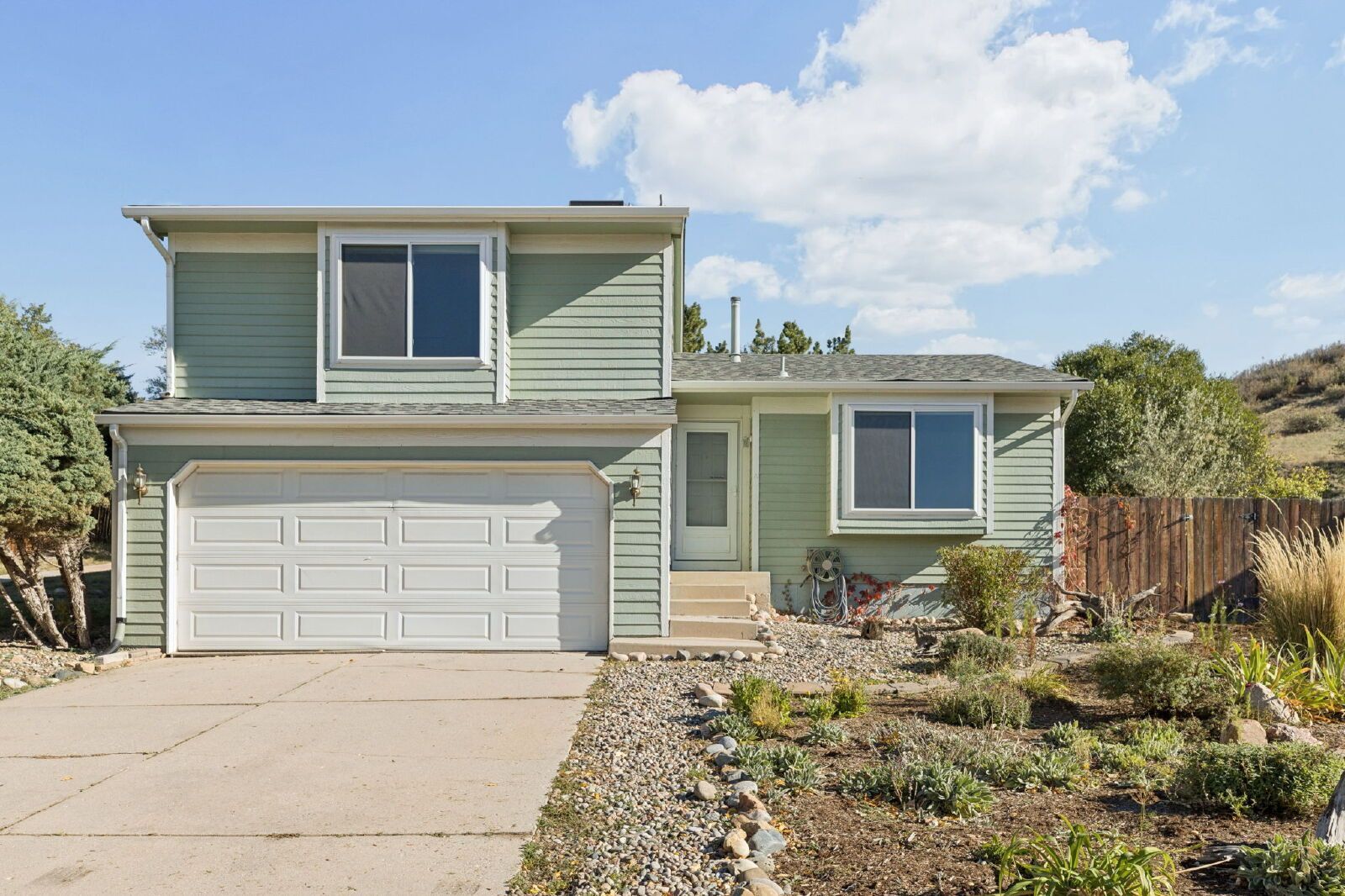 Updated 4-Bedroom Home with A/C, Finished Basement, and 2-Car Garage Near Fort Carson property image