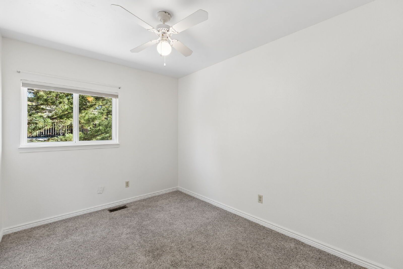 Updated 4-Bedroom Home with A/C, Finished Basement, and 2-Car Garage Near Fort Carson property image