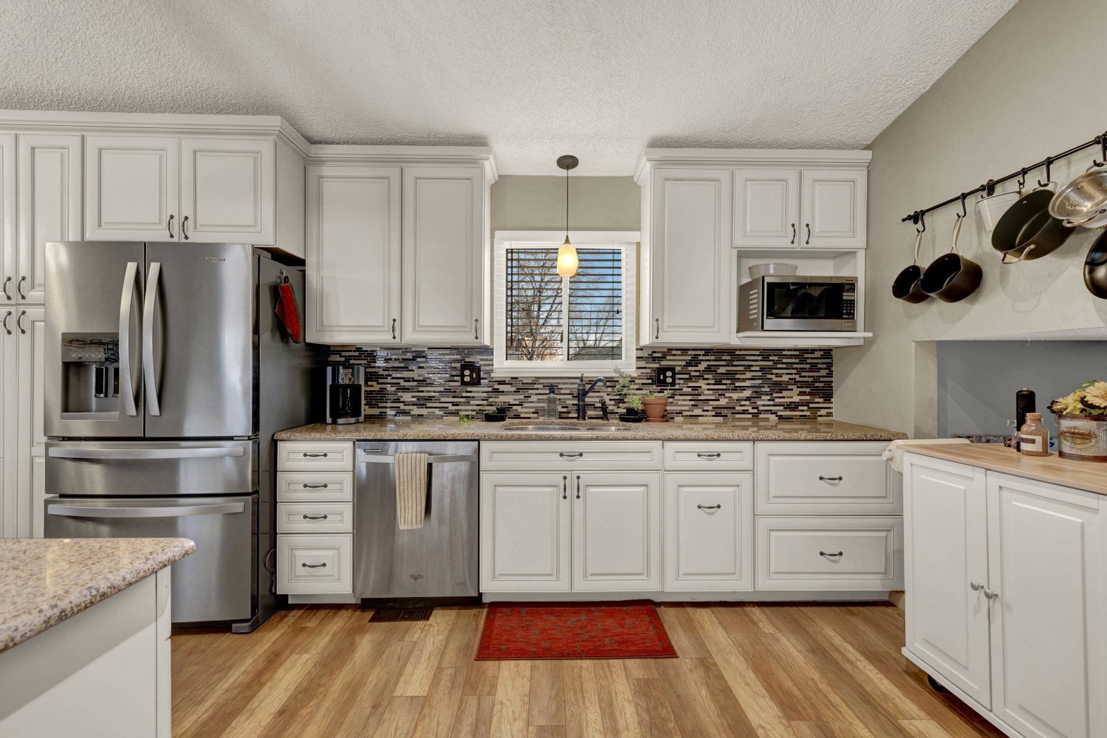 Updated 4-Bedroom Home with Wood-Burning Fireplace, Finished Basement, and 2-Car Garage Near USAFA property image