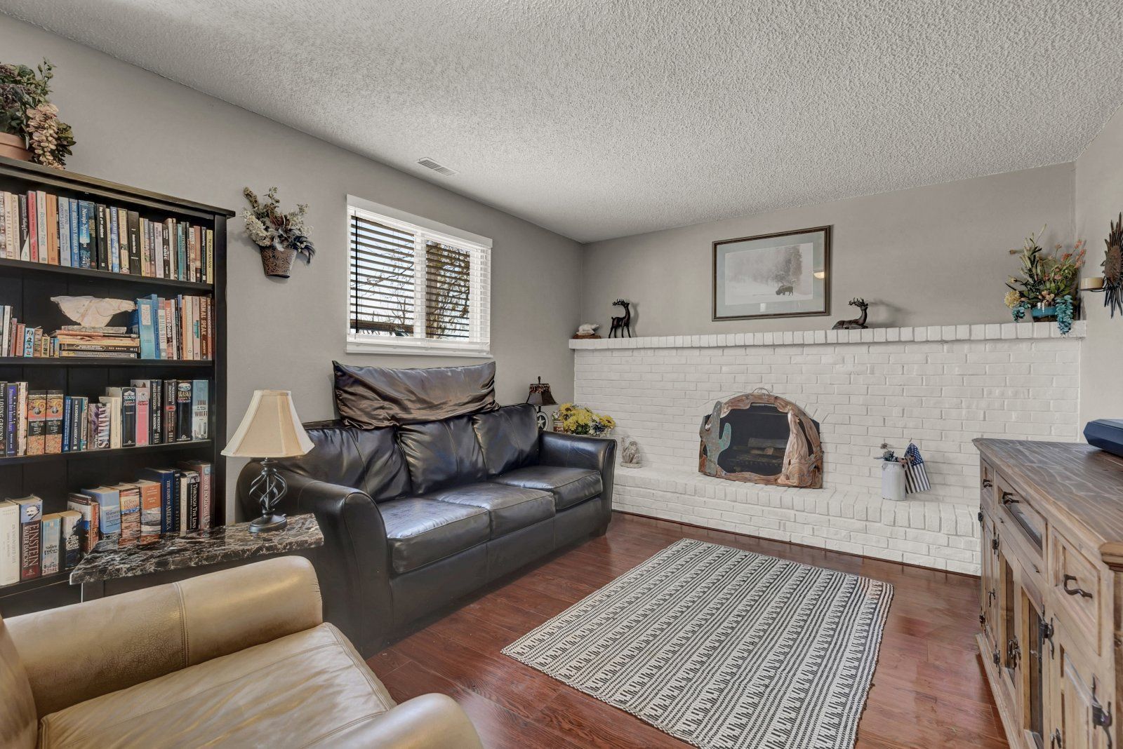 Updated 4-Bedroom Home with Wood-Burning Fireplace, Finished Basement, and 2-Car Garage Near USAFA property image