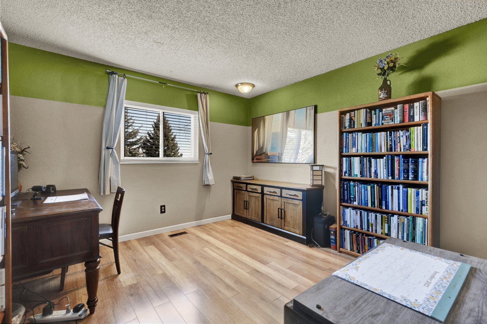 Updated 4-Bedroom Home with Wood-Burning Fireplace, Finished Basement, and 2-Car Garage Near USAFA property image