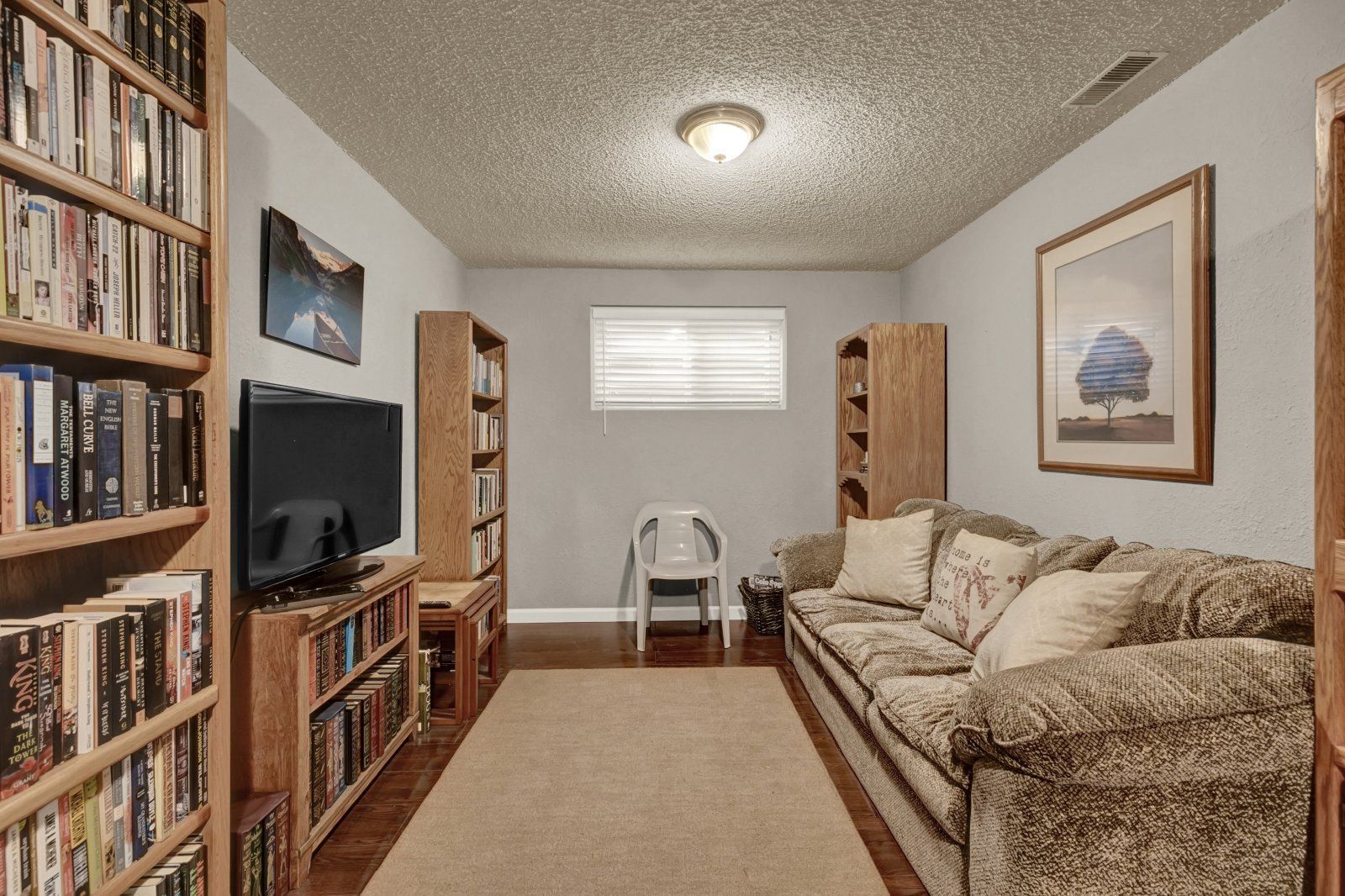 Updated 4-Bedroom Home with Wood-Burning Fireplace, Finished Basement, and 2-Car Garage Near USAFA property image