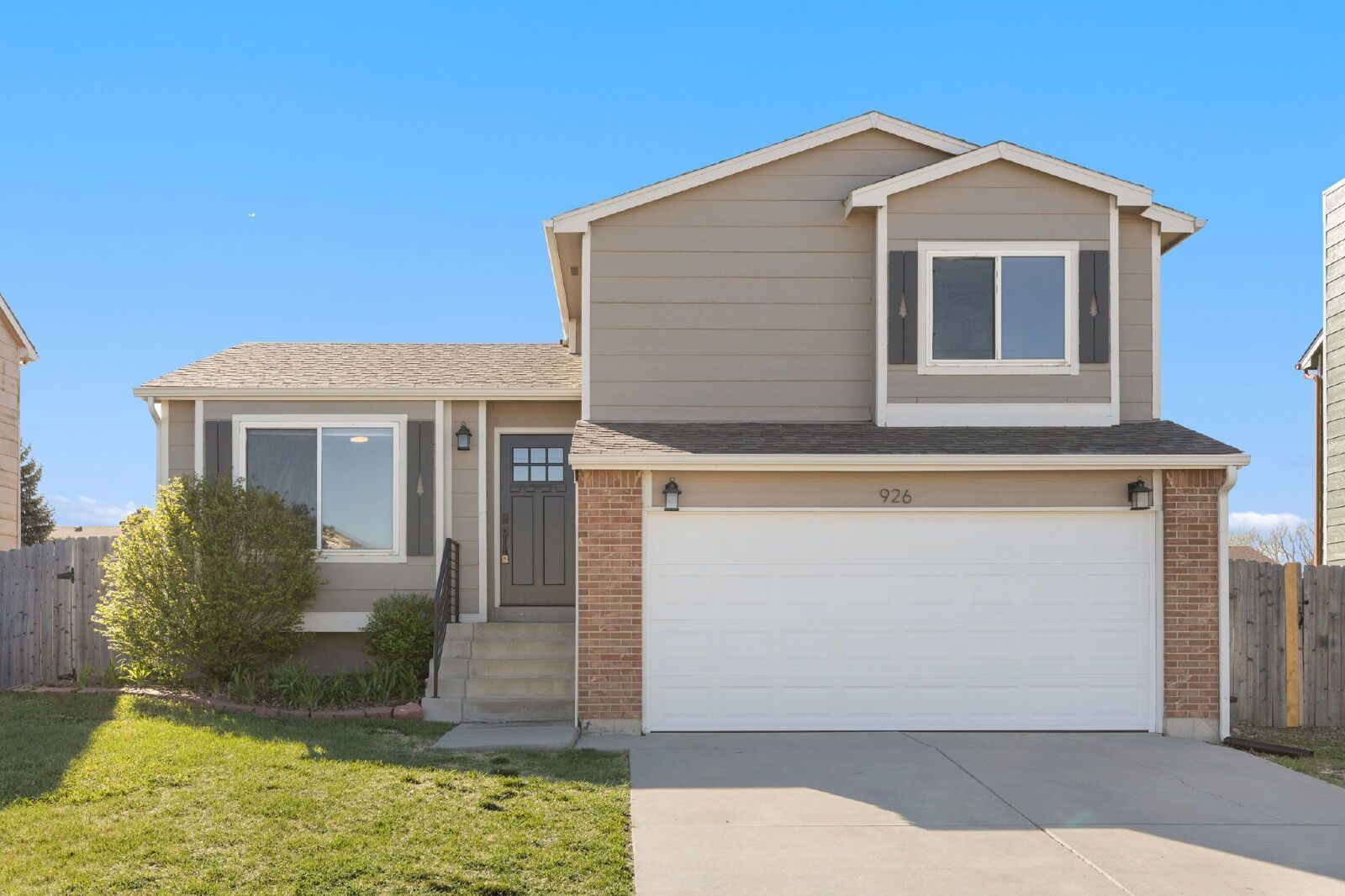 Spacious Four-Level Home with Fireplace, Finished Basement, and Walkout Backyard in Fountain property image