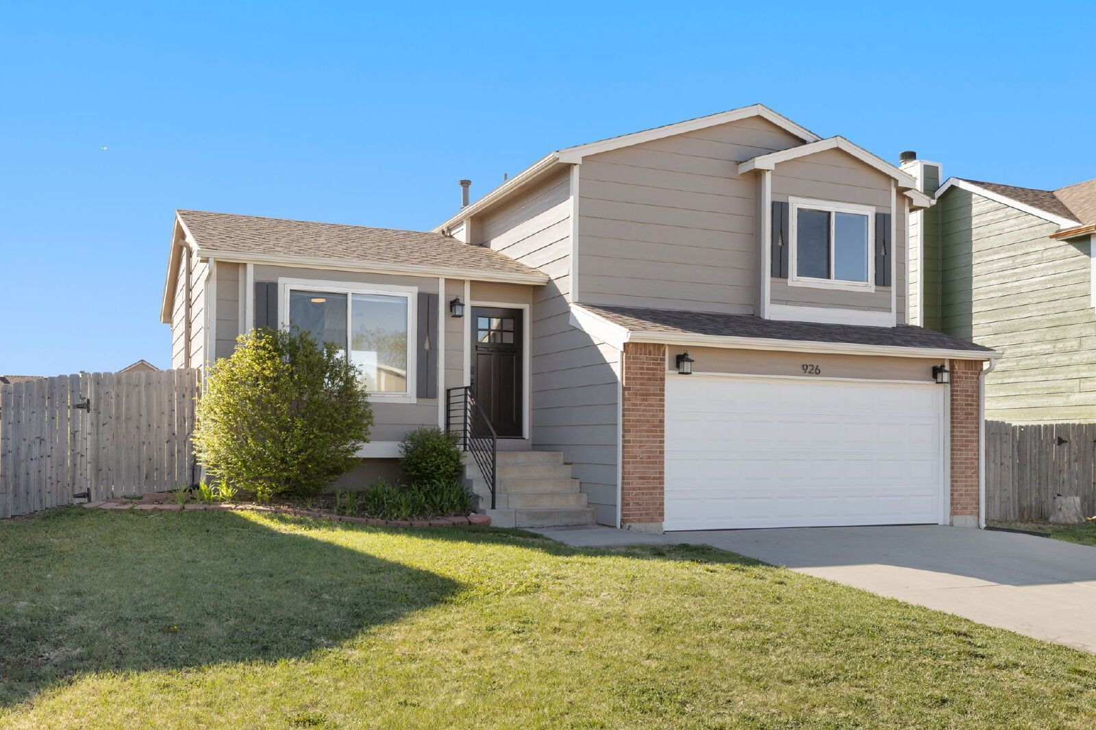 Spacious Four-Level Home with Fireplace, Finished Basement, and Walkout Backyard in Fountain property image