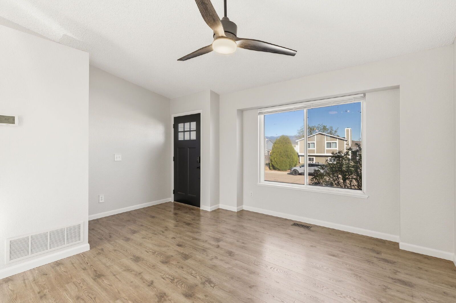 Spacious Four-Level Home with Fireplace, Finished Basement, and Walkout Backyard in Fountain property image