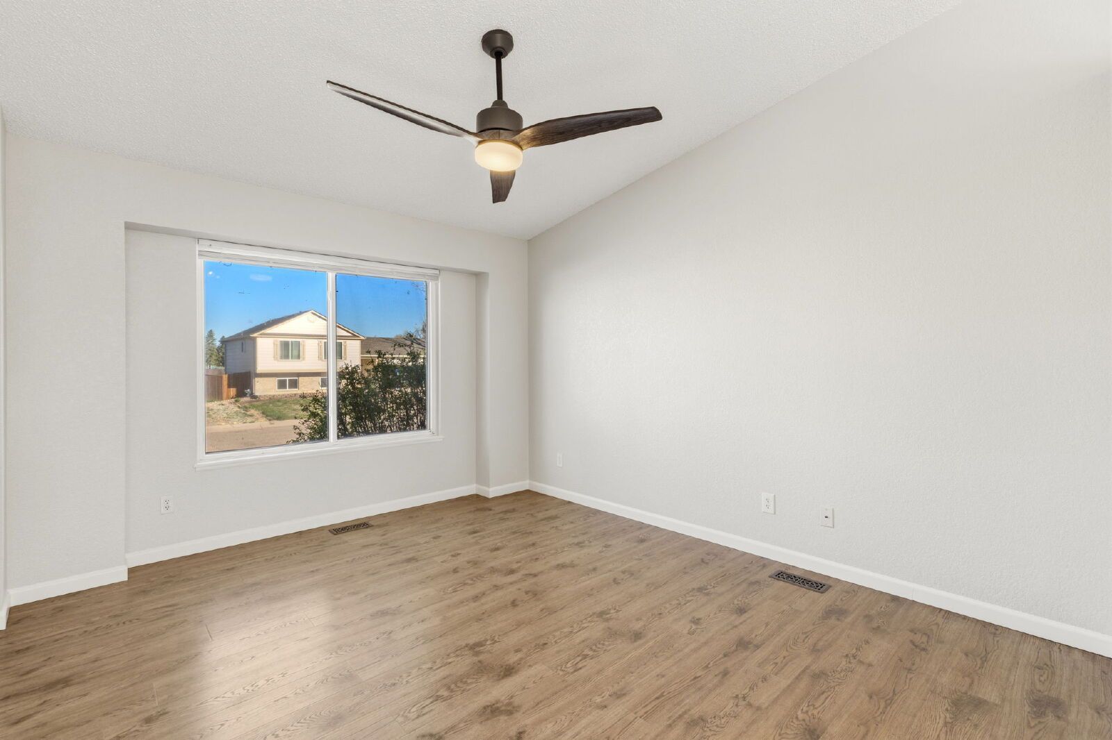 Spacious Four-Level Home with Fireplace, Finished Basement, and Walkout Backyard in Fountain property image