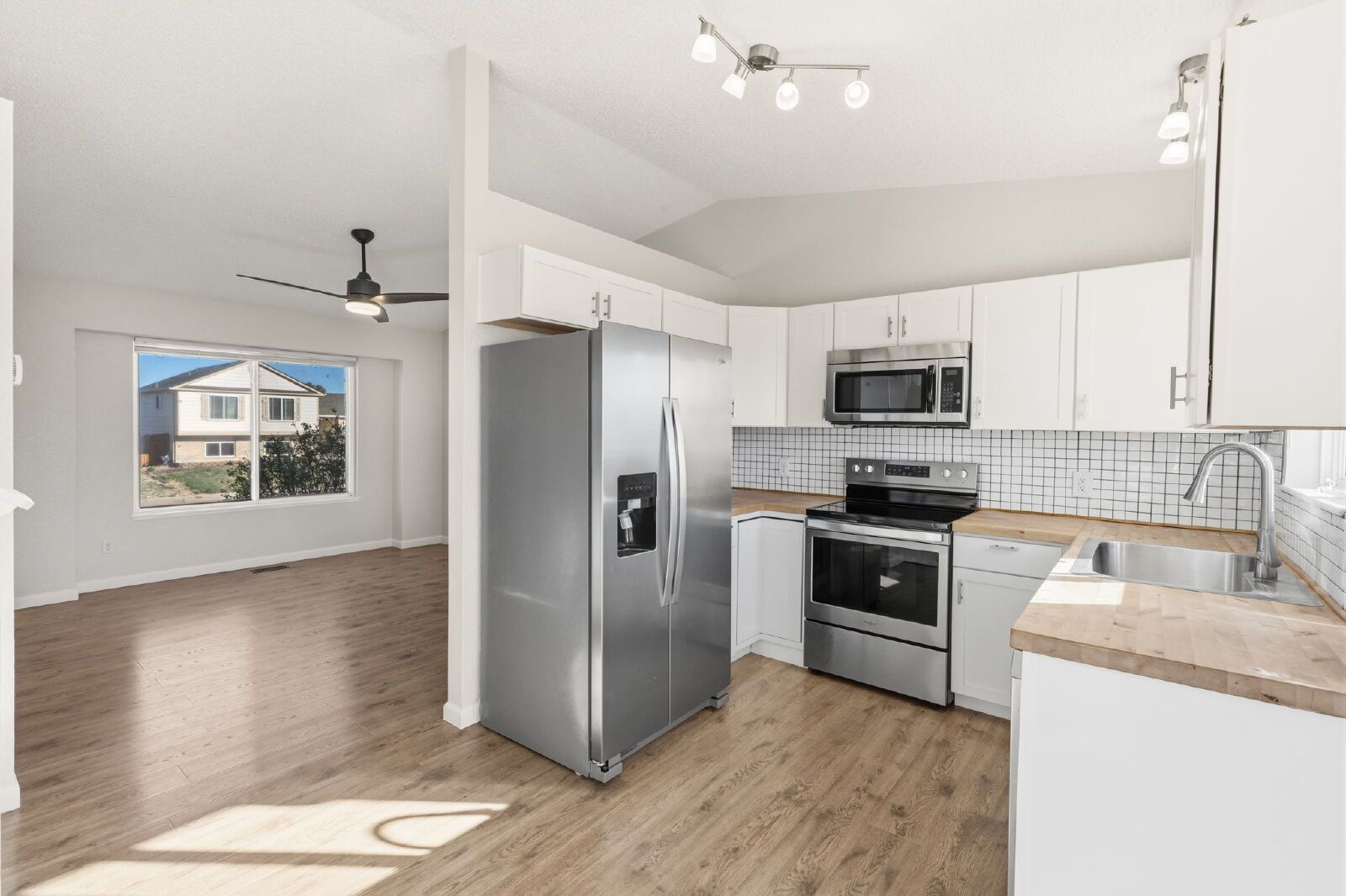 Spacious Four-Level Home with Fireplace, Finished Basement, and Walkout Backyard in Fountain property image