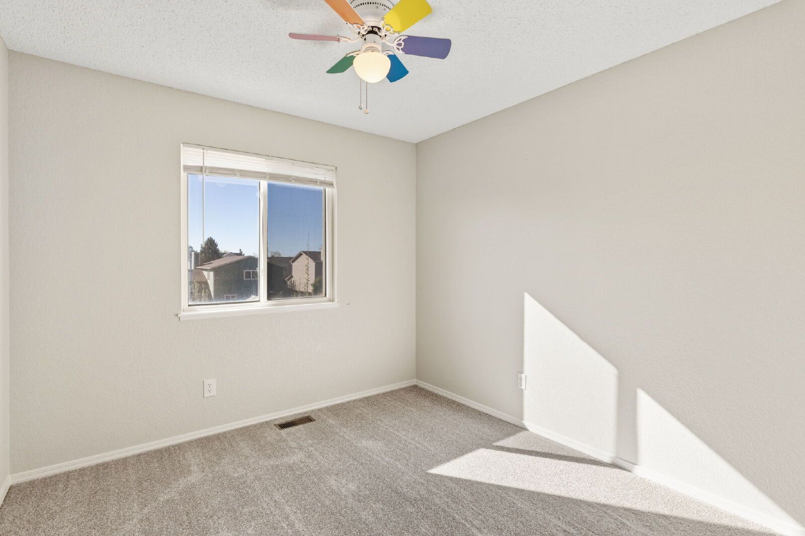 Spacious Four-Level Home with Fireplace, Finished Basement, and Walkout Backyard in Fountain property image