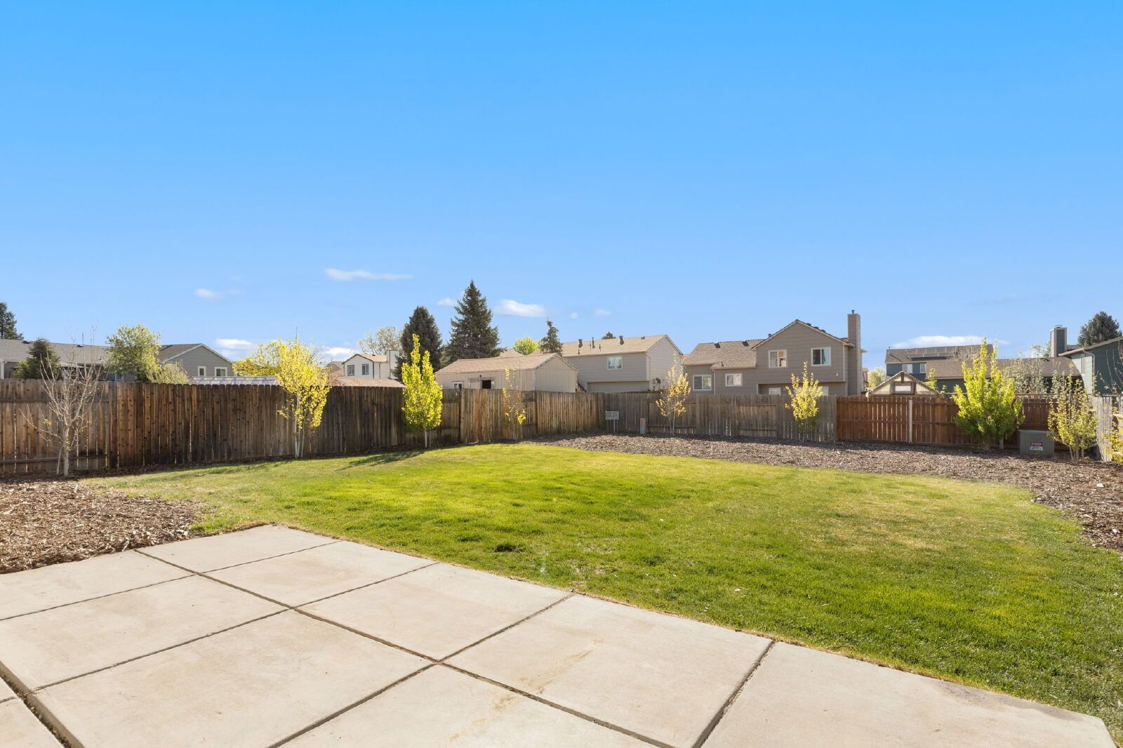 Spacious Four-Level Home with Fireplace, Finished Basement, and Walkout Backyard in Fountain property image