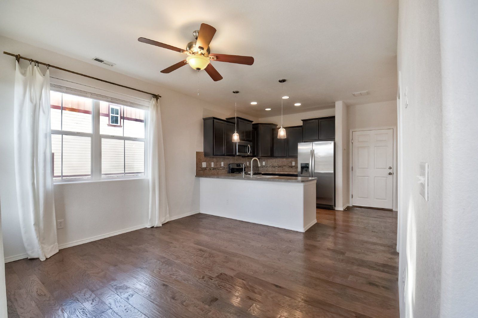 Immaculate 3-Bedroom Townhome with Stainless Steel Appliances and Attached Garage Near Peterson SFB property image
