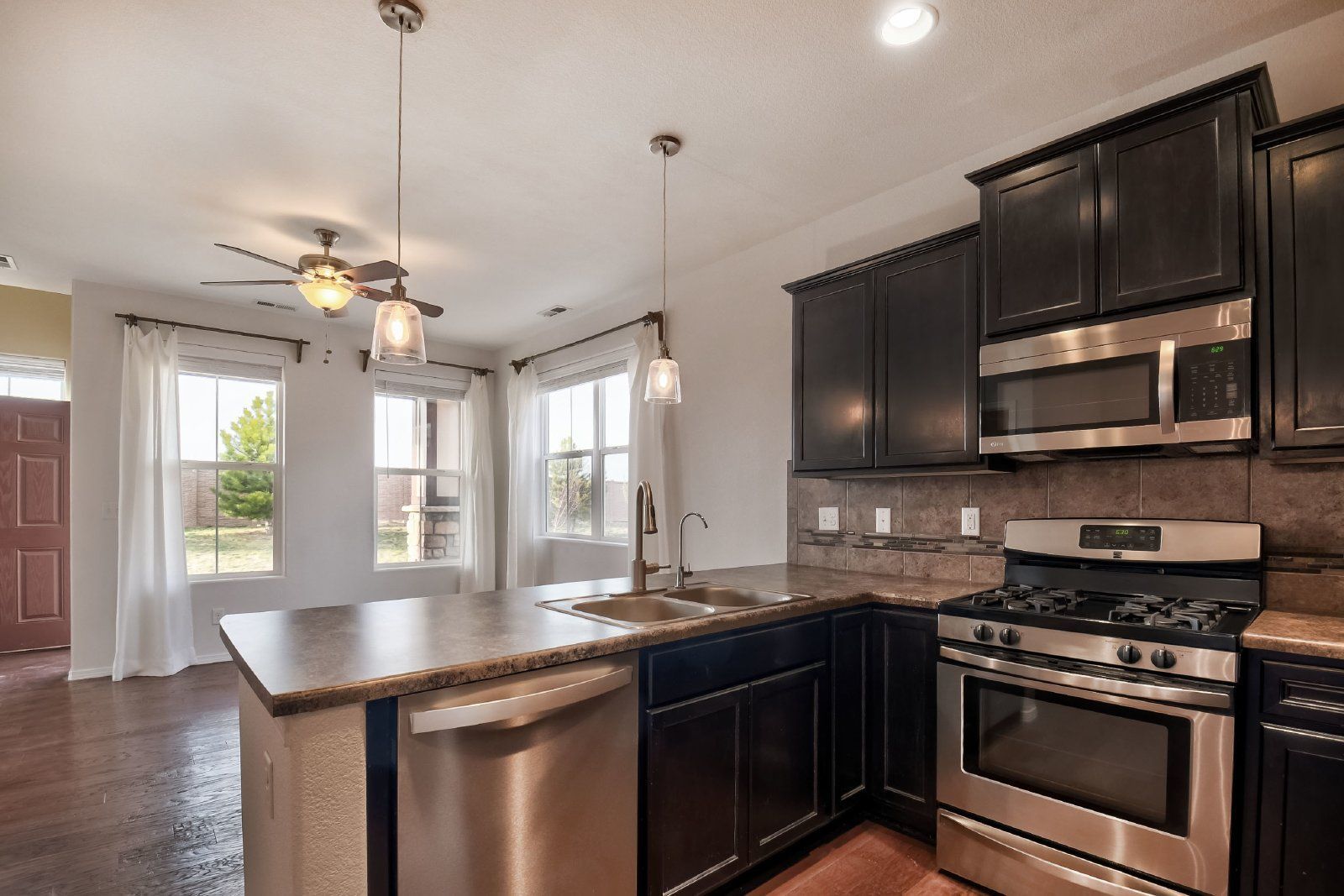 Immaculate 3-Bedroom Townhome with Stainless Steel Appliances and Attached Garage Near Peterson SFB property image