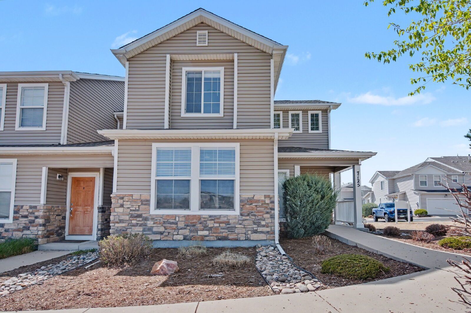 Beautifully Updated 3-Bedroom End-Unit Townhome Facing Open Space with Attached 2-Car Garage in Gated Sand Creek Villas property image