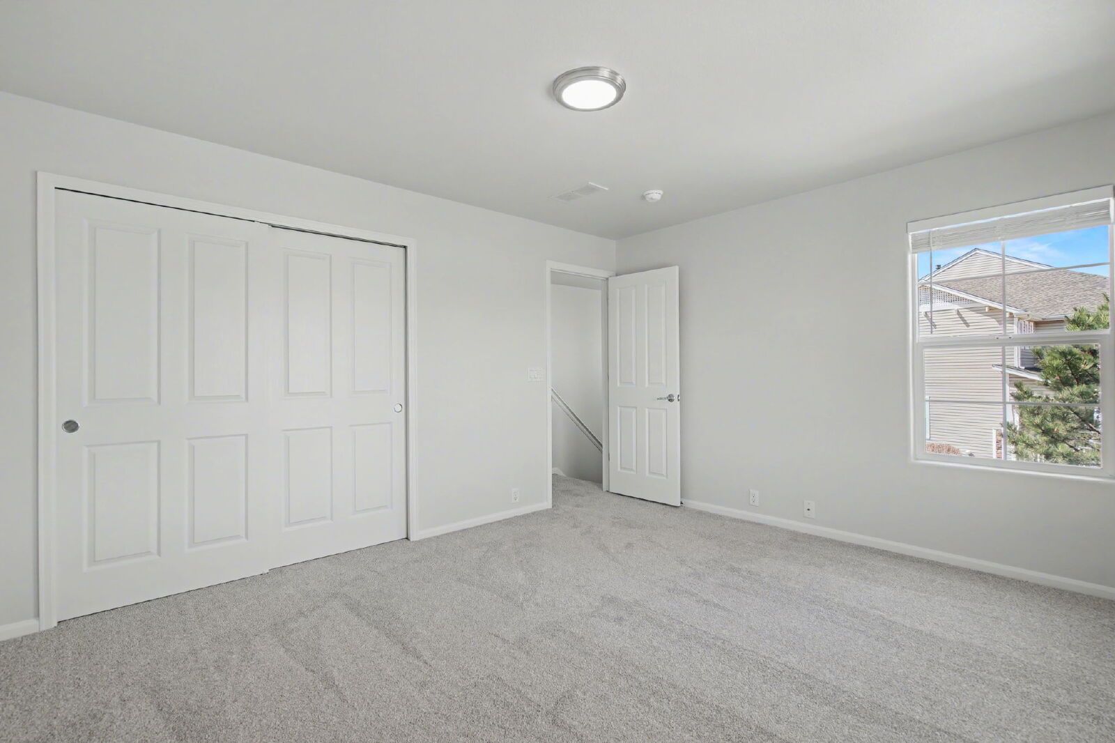 Beautifully Updated 3-Bedroom End-Unit Townhome Facing Open Space with Attached 2-Car Garage in Gated Sand Creek Villas property image