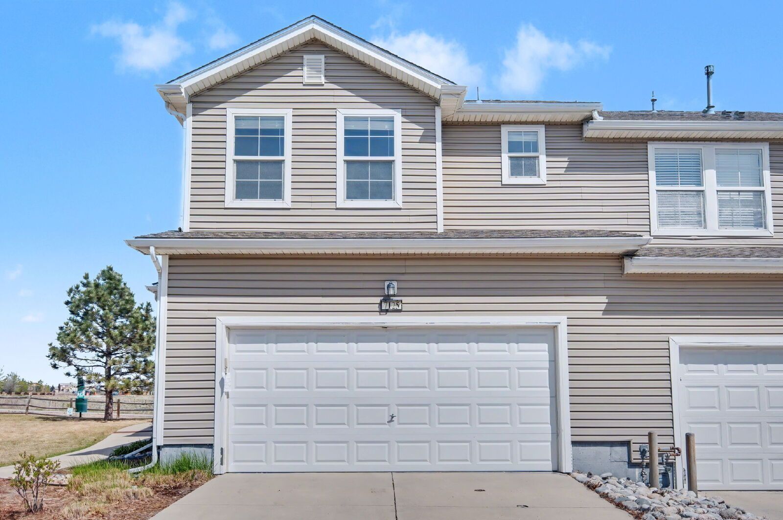 Beautifully Updated 3-Bedroom End-Unit Townhome Facing Open Space with Attached 2-Car Garage in Gated Sand Creek Villas property image